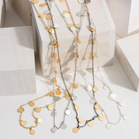 Multi Tone Long Necklace Featuring Metal Accents.