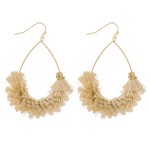 Natural textured fringe tassel teardrop earrings.