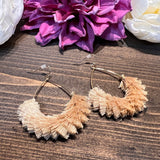 Natural textured fringe tassel teardrop earrings.